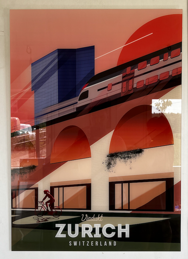A stylized travel poster of Viadukt Zurich on plexiglas, featuring a modern SBB train on elevated tracks over Viadukt, with a cyclist in the foreground and bold geometric color blocks in terracotta, orange, cream, and dark blue.